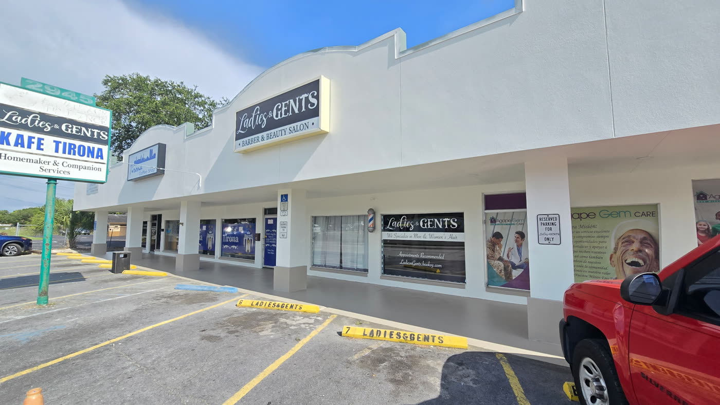 Repainted commercial retail plaza storefronts in the Tampa Bay area