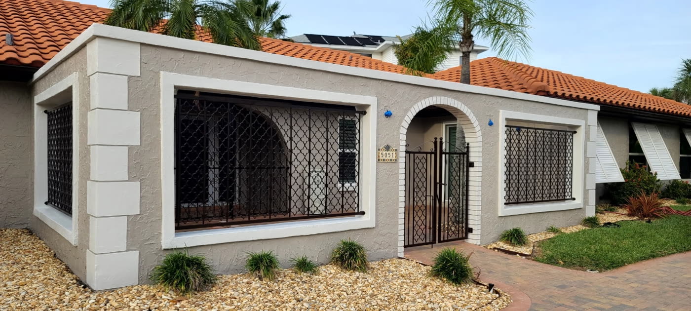 Repainted home exterior with columns and detailed trim work in the Tampa Bay area